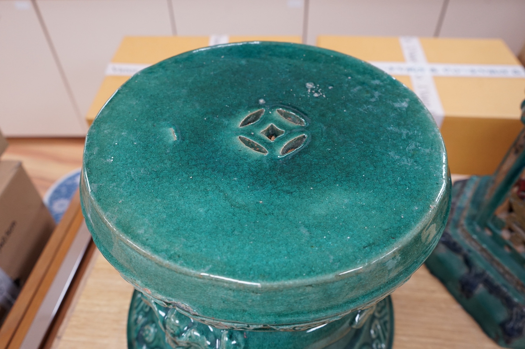 Two Chinese ceramic turquoise glazed garden seats, largest 41cm high. Condition - fair
